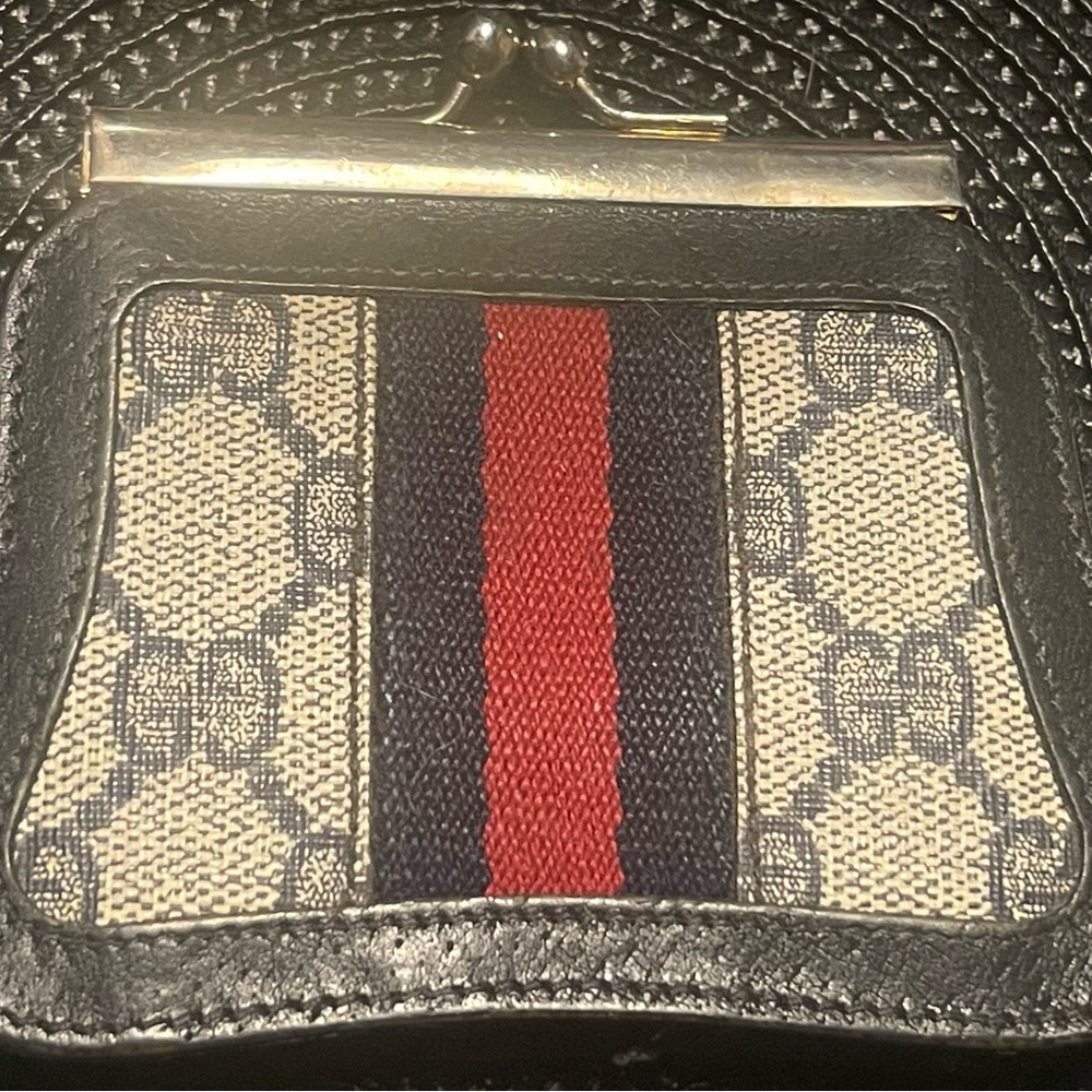 Vintage Gucci navy GG coin purse.